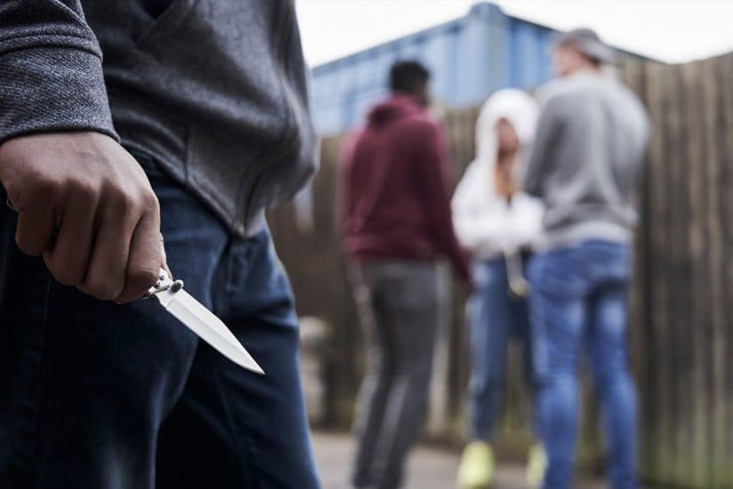 Person holding a knife